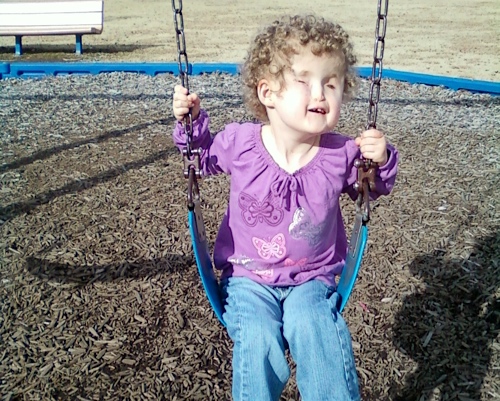 Madilyn on the swing