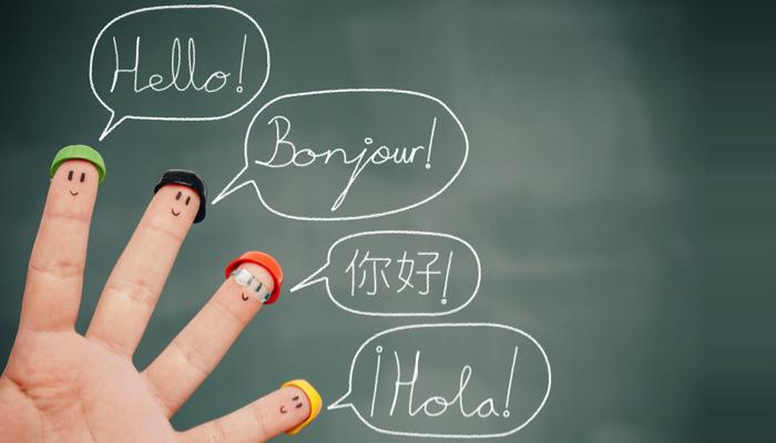 4 fingers with faces speaking different languages