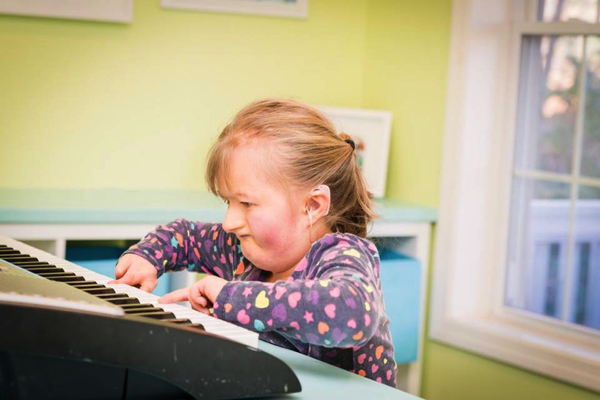 Alexis playing piano