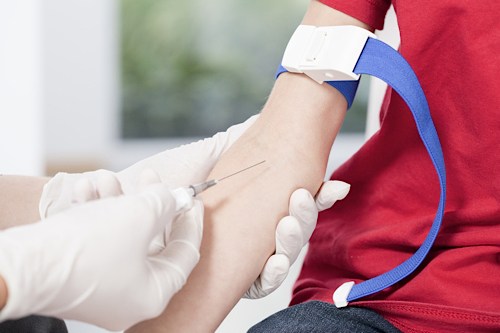 A child getting their blood drawn