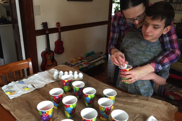 Placing eggs in the cups