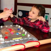 Ivan decorating a gong