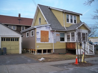 The new bathroom is framed and has siding