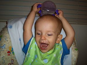 Ivan loves putting his water cup on his head!