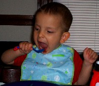 Ivan eating watermelon.