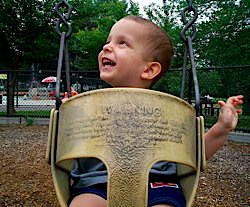 Ivan swinging at the park