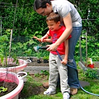 Ivan watering the garden