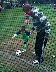 Patrick and David playing soccer