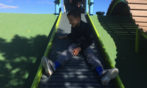 Ivan on an accessible slide