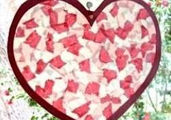 Tissue paper heart suncatcher hanging in the window