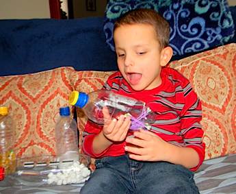 ivan playing with his rattle