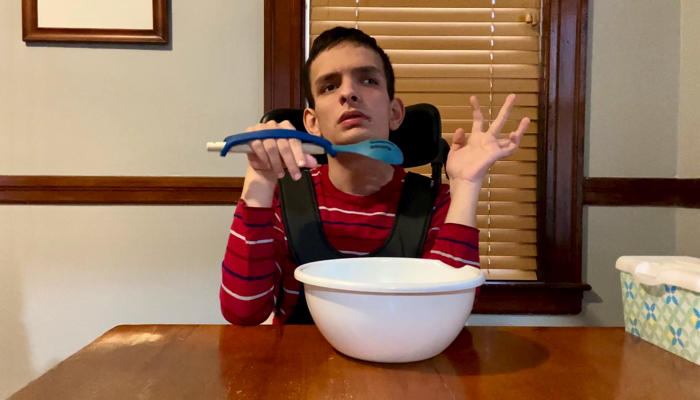 Ivan using an EazyHold with a mixing spoon