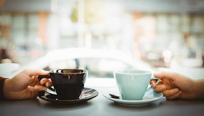 two friends having coffee