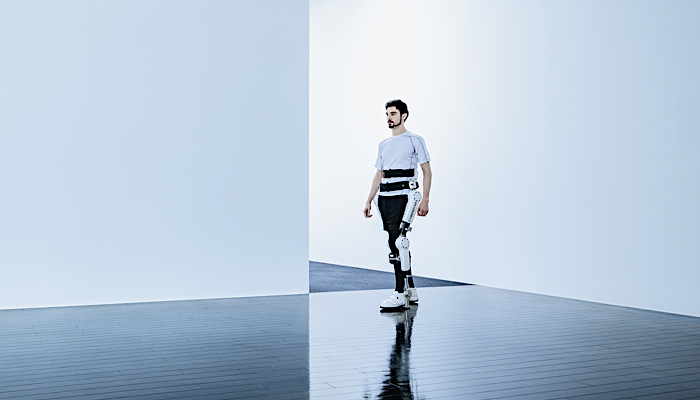 Man trying out the robotic exoskeleton