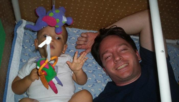 Ivan with his dad in his sensory play area