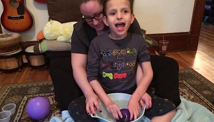 Ivan siling with his sink or float experiment