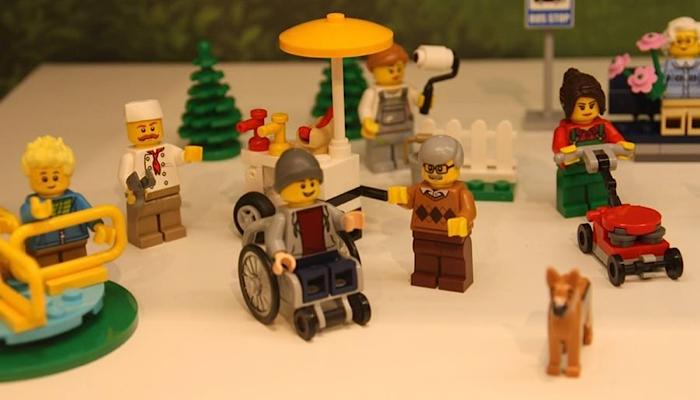 LEGO play set featuring a boy in a wheelchair