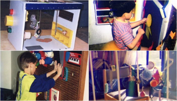 Blind child touching a sensory board