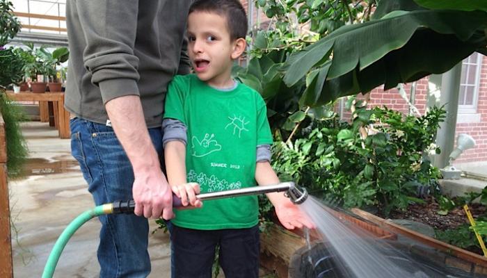 Ivan watering the plants
