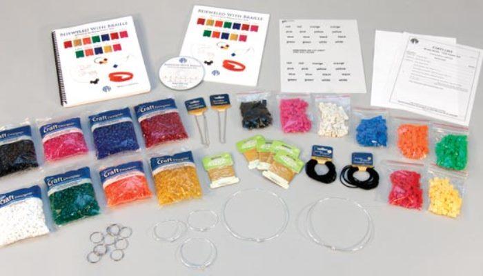 Braille beads kit including packets of beads, wire and instruction booklets