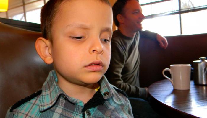 Ivan and dad at the cafe