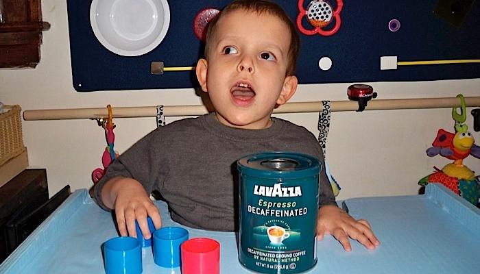 Ivan playing with his can puzzle