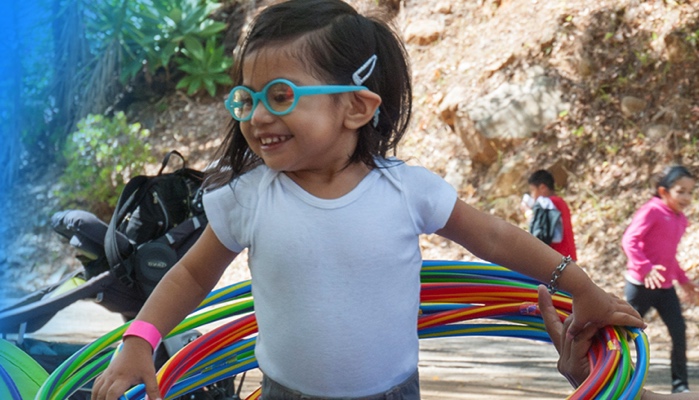 little girl wearing glasses