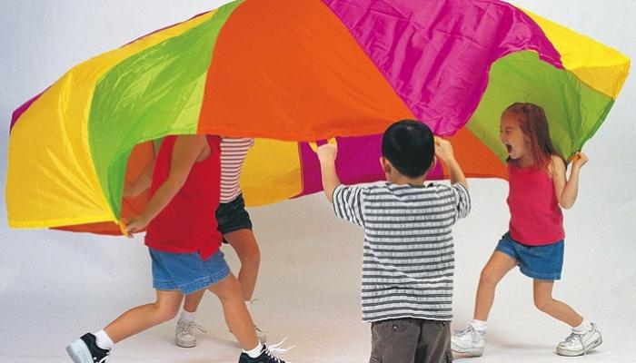 parachute with kids running underneath