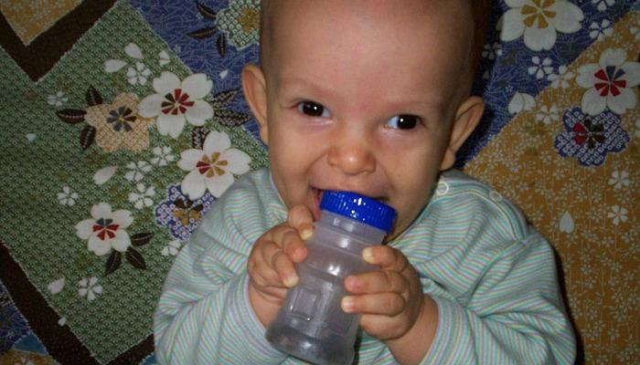 Ivan playing with his scented rattle