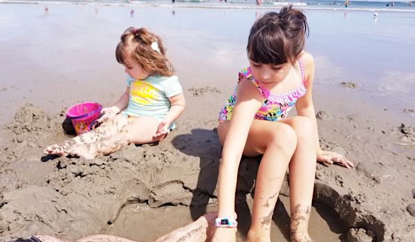 Rebecca and her sister at the beach