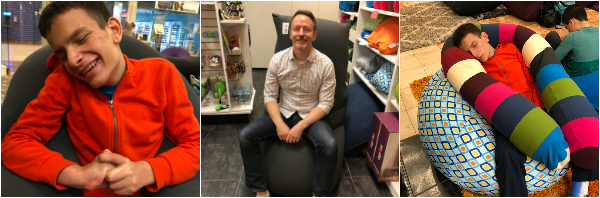 Ivan and his dad sitting in Yogibos at the store