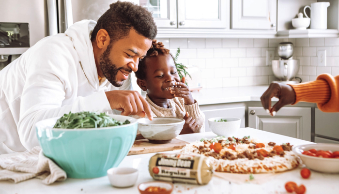 family making dinner