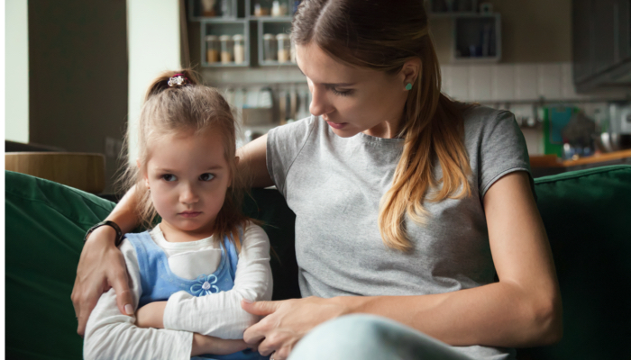 mother talking to daughter