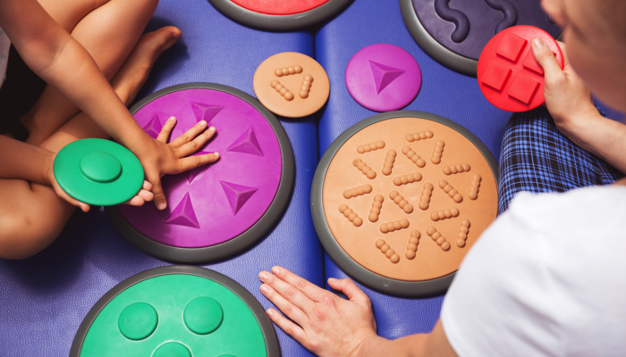 sensory toys on a mat