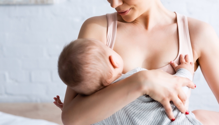 Mom breastfeeding her child.