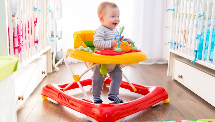 Happy baby in a walker.