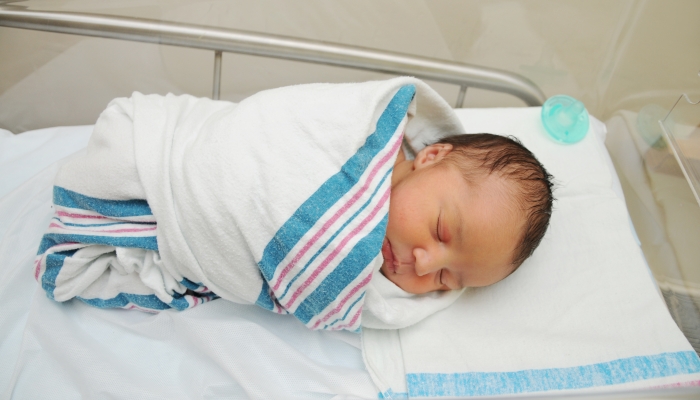 Baby wrap in a receiving blanket.