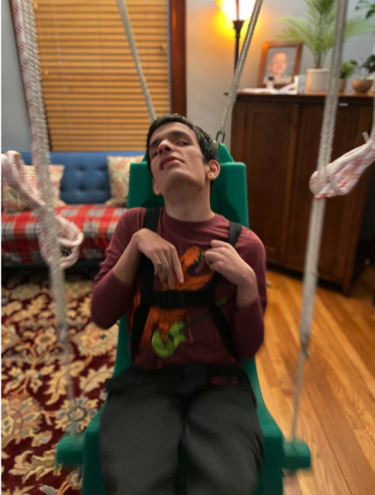 Ivan in his special needs swing