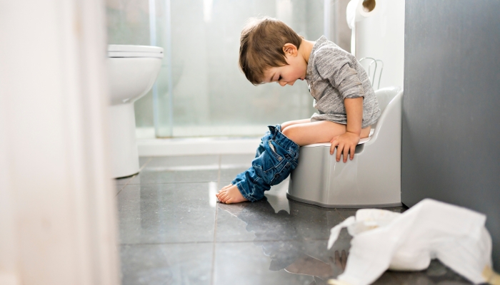 Two year old boy on chamber pot.