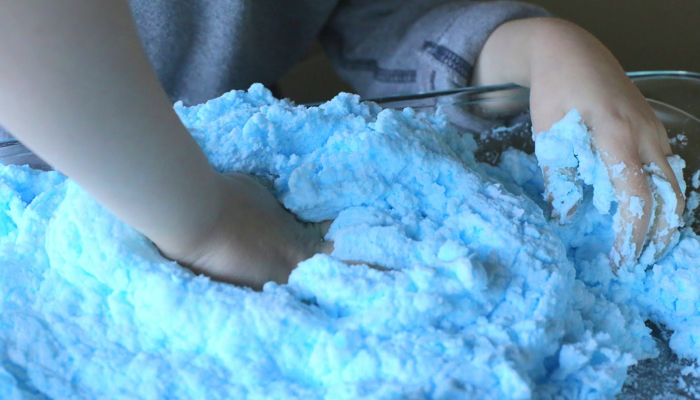 Magic puffing snow sensory table idea.