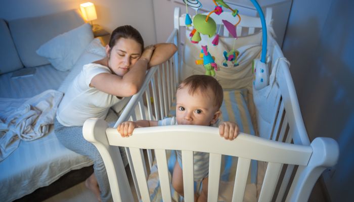 Baby awake in crib.