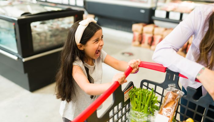 Girl screaming at mom in store.