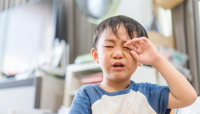 Tantrum and angry boy at home.