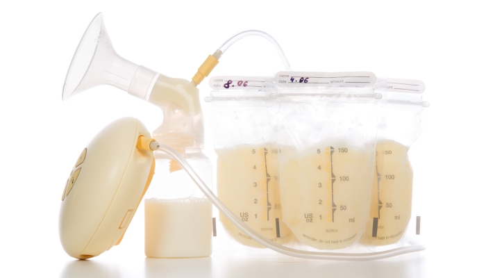 Breast pump and bags of frozen breastmilk.