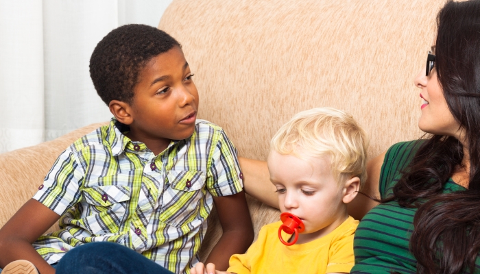 Children speaking.