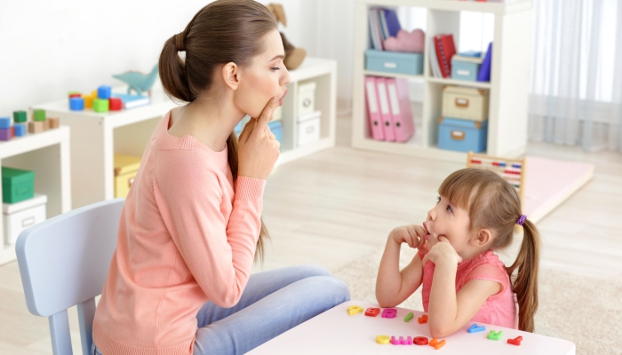 Girl at speech therapist office.