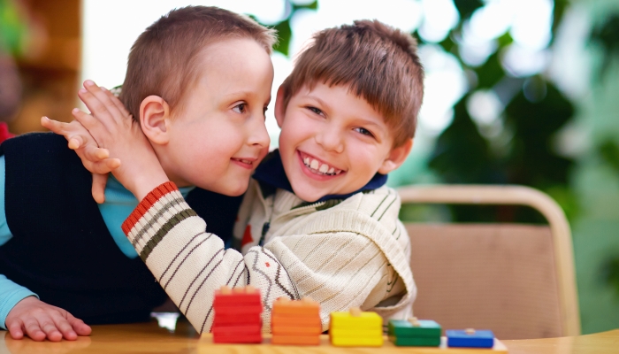 Happy kids with disabilities in preschool.