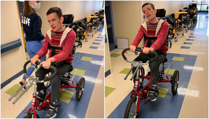 Ivan in his Rifton Adaptive Tricycle.