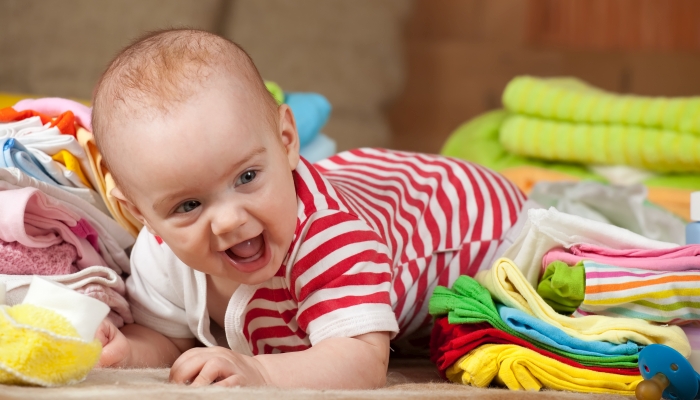 Baby girl with children's wear.