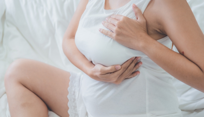 Breastfeeding woman have breast pain.